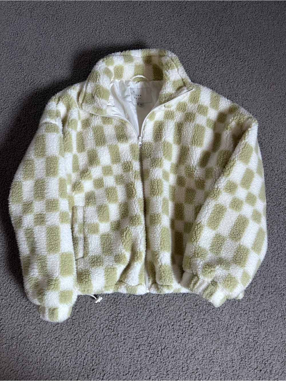 A new day checkered green and white Sherpa jacket
